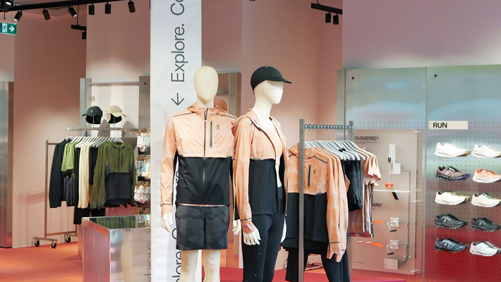 The wider On retail store environment showing the Hybrid Explorer integrated into the in-store shopping experience